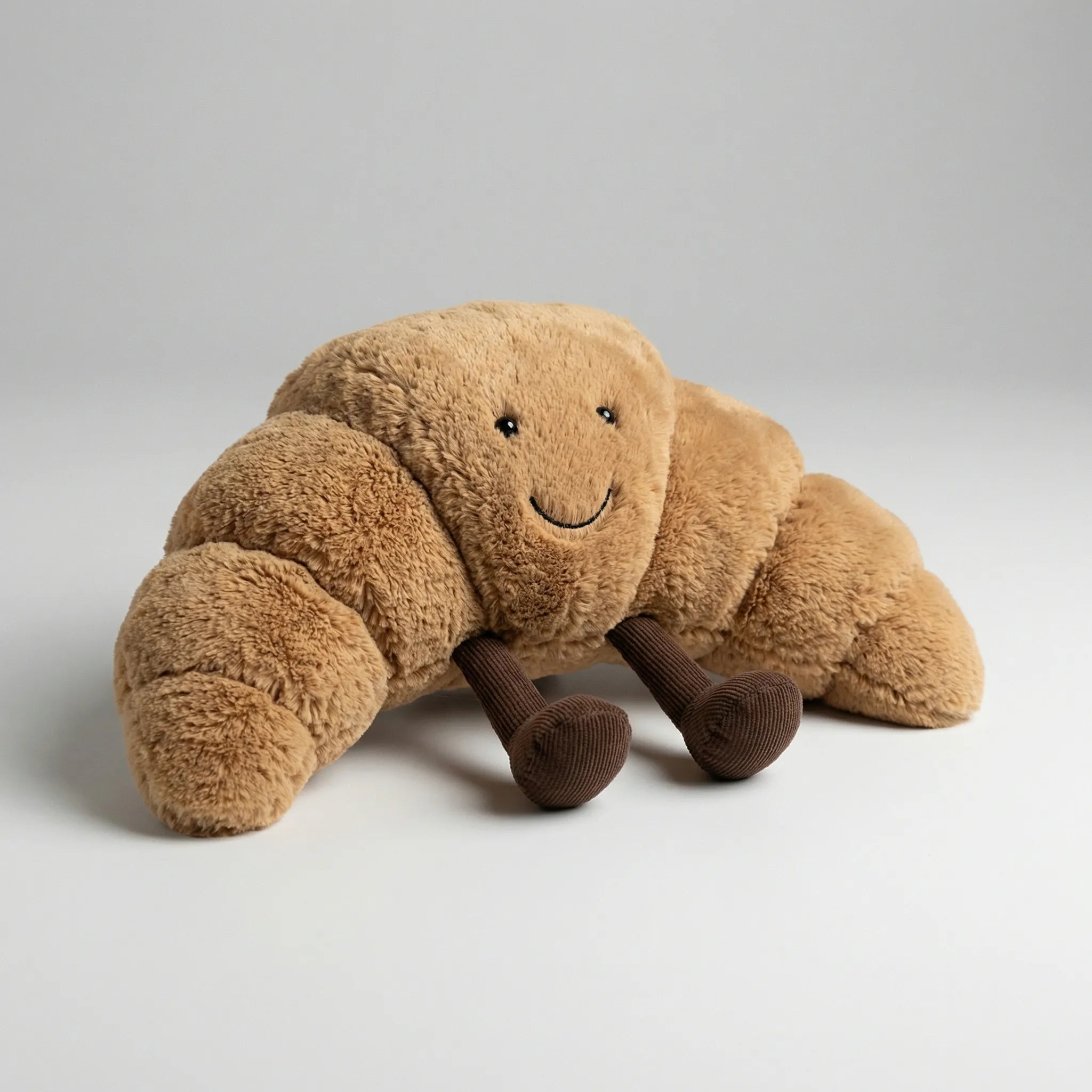 Croissnuggle - Blød Krammebamse I Croissantform Nuvenci.dk