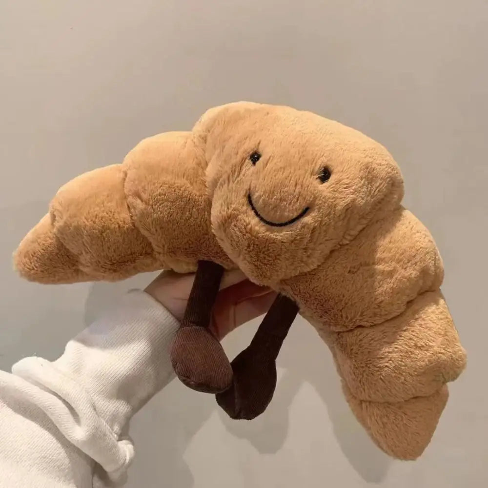 Croissnuggle - Blød Krammebamse I Croissantform Nuvenci.dk
