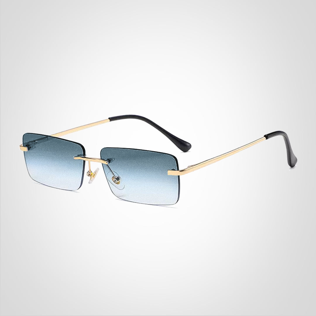 ShadeGuard | Solbrille – Elegance til Hverdag og Eventyr Guldramme grå linse Nuvenci.dk