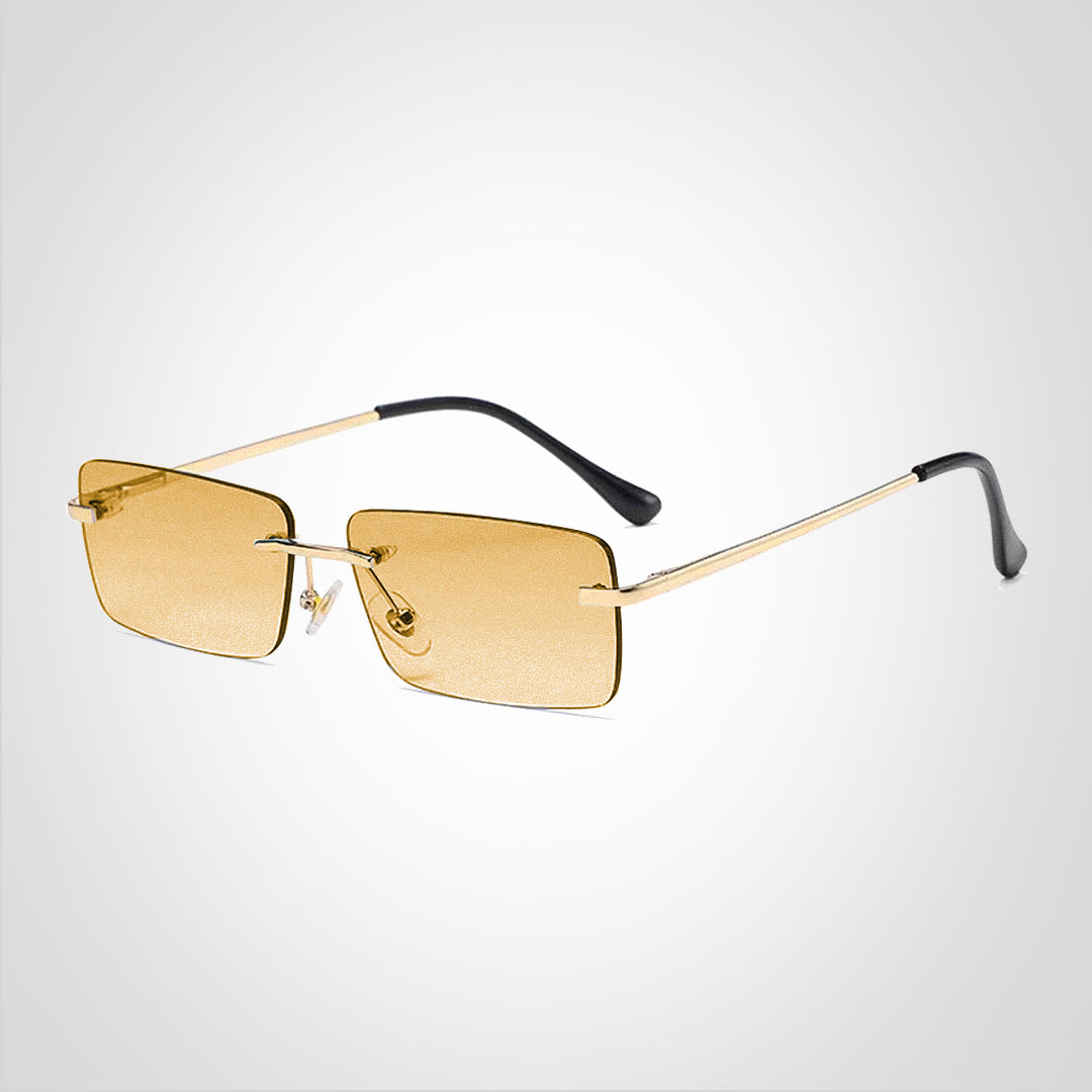 ShadeGuard | Solbrille – Elegance til Hverdag og Eventyr Guldrammet orange linser Nuvenci.dk