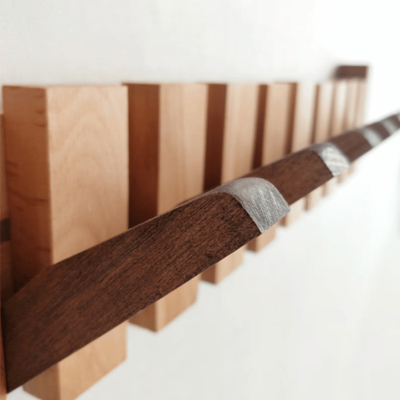 WoodNote | Funktionel Knagerække i Pianodesign Nuvenci.dk